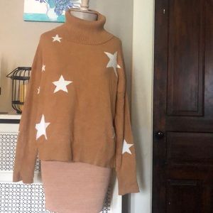 Hem and thread turtleneck sweater